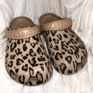 Women’s size 8 cheetah crocs.